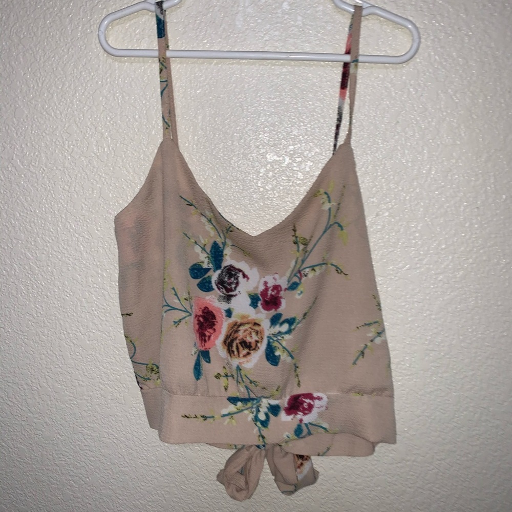 A cropped tank top that ties in the back